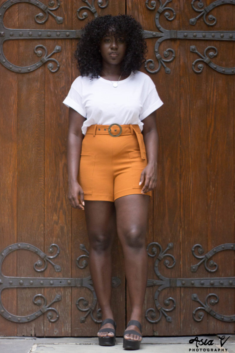 White T Shirt, Orange Shorts