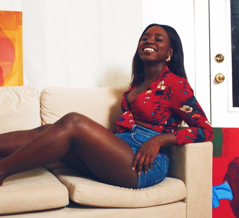 red tie front blouse, blue high waist shorts